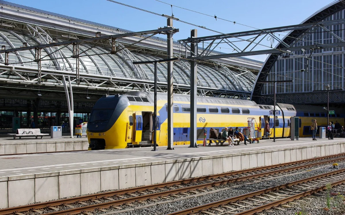 NS VIRM train at a platform in Amsterdam Centraal